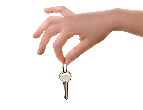 Zbliżenie dłoni trzymając klucz — Zdjęcie stockowe