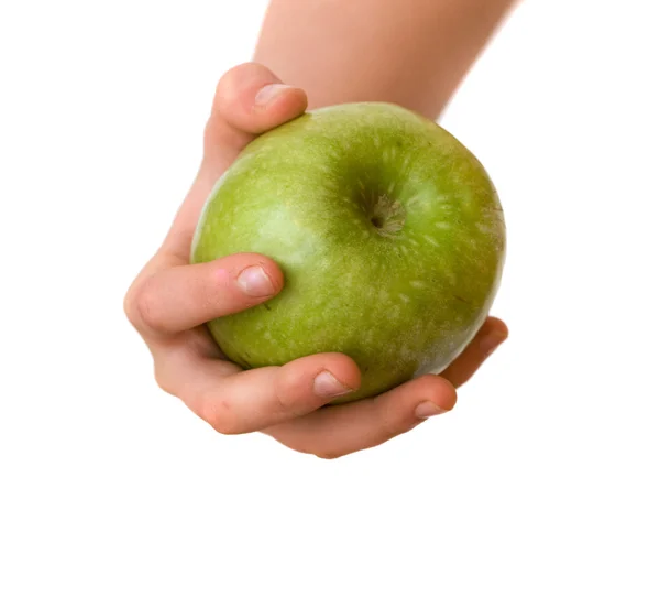 Handen håller grönt äpple — Stockfoto