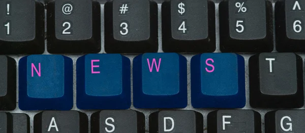 Клавіатура зі словом "новини " — стокове фото