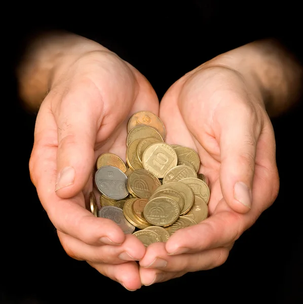 stock image Palms full with coins