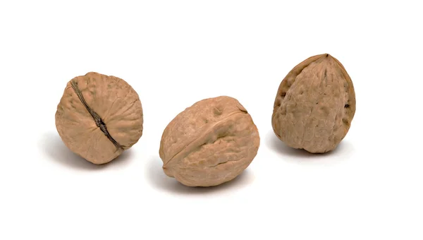 Три грецких ореха — стоковое фото