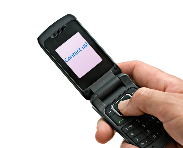 Mobilní telefon s popiskem "kontaktujte nás" na jeho ob — Stock fotografie