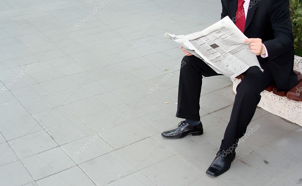 Reading Newspaper Stock Photo By C Vaximilian