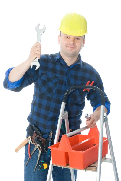 Worker holding wrench — Stock Photo, Image