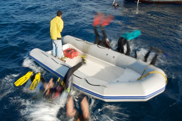 潜水员从十二宫跳转 免版税图库图片