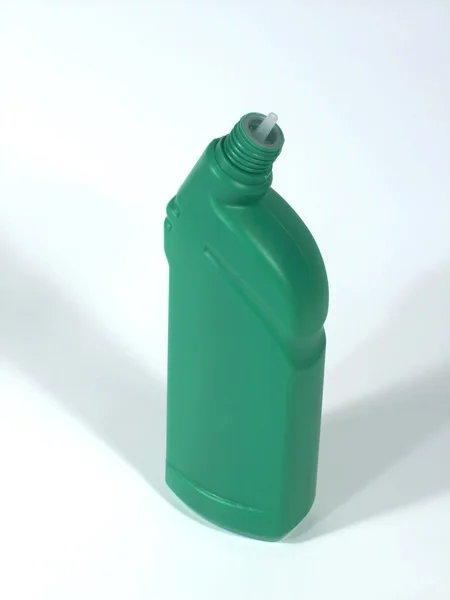Bottiglia verde per la pulizia — Foto Stock