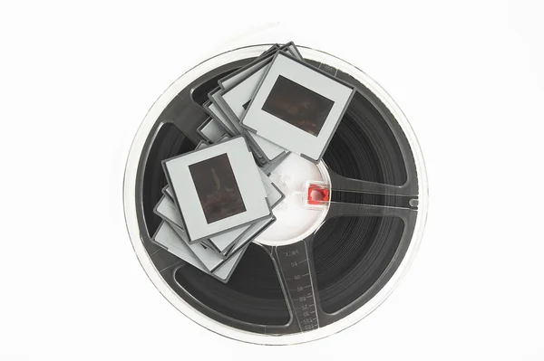 Vintage 16mm Film Reels and Cine-film on White Background Isolated