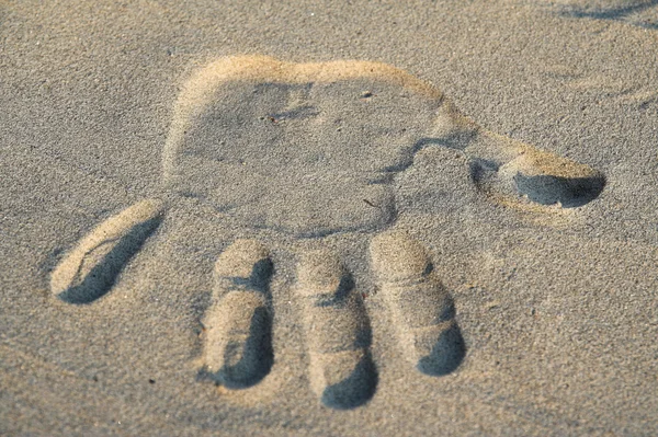 Hand sign in sand — Stock Photo, Image