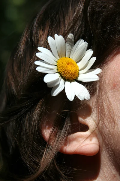 Λουλούδι και το αυτί κορίτσι Φωτογραφία Αρχείου