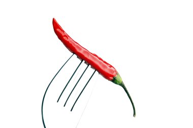 Red chili pepper on a fork clipart