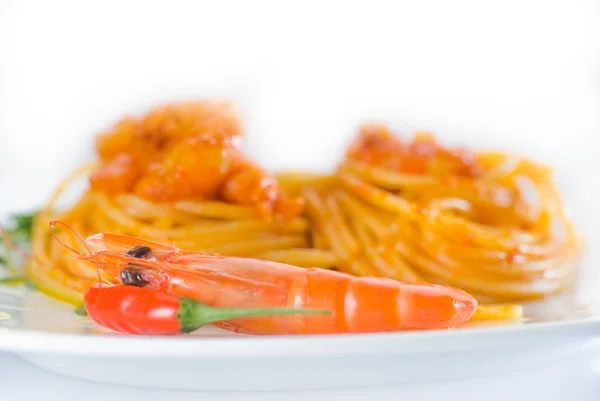 Pasta and spicy shrimps Stock Picture