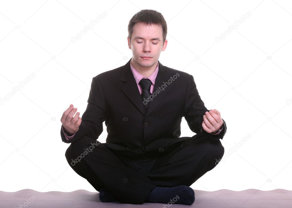 Businessman doing yoga