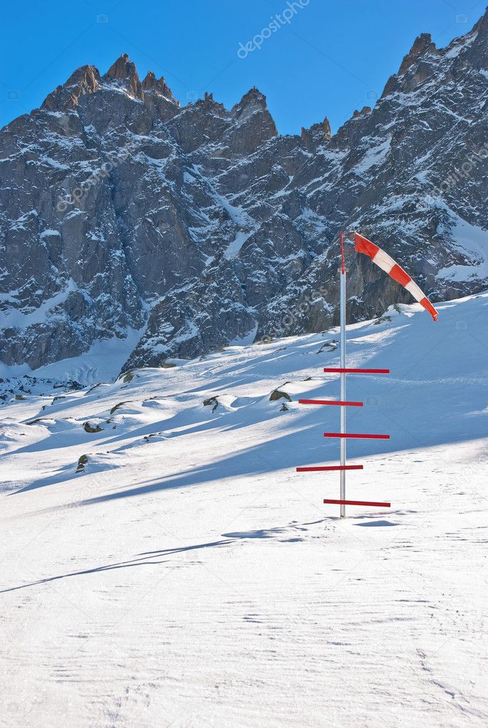 Windsock and snow level meter