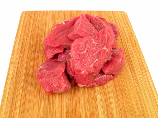 Fresh raw beef on cutting board — Stock Photo, Image