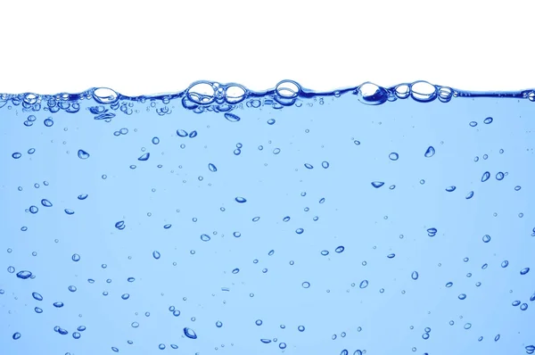 Чистою блакитною водою хвилі — стокове фото