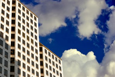 White High-Rise in the Clouds clipart