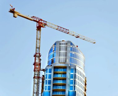 Blue High-Rise With Crane clipart