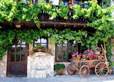 Old horse-car with flowers clipart