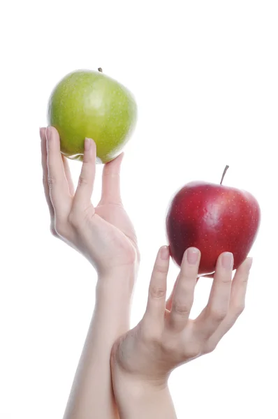 Due mele in mano Foto Stock