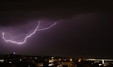 Storm and lightning over city clipart