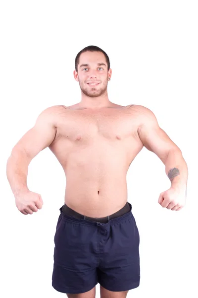 Jonge bodybuilder poseren — Stockfoto