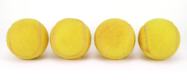 Dört tenis topları — Stok fotoğraf