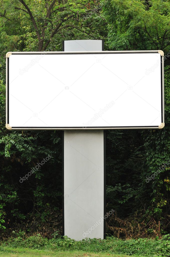 Blank billboard and trees