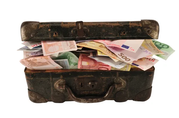 Pénzzel teli bőrönd — Stock Fotó