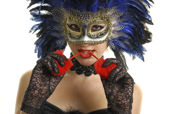 Vacker kvinna med en karneval masque — Stockfoto