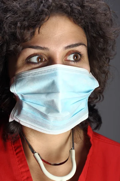 Zdravotní sestra s lékařskou maskou — Stock fotografie