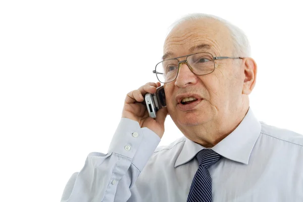 Mogna affärsman talar i sin mobiltelefon — Stockfoto