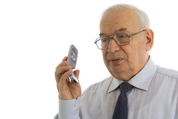 Mature businessman talking on his cell phone — Stock Photo, Image