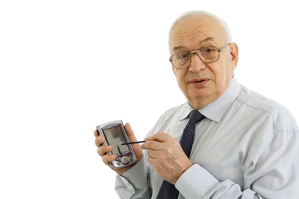 Erfolgreicher Geschäftsmann arbeitet an einem PDA-Veranstalter lizenzfreie Stockbilder