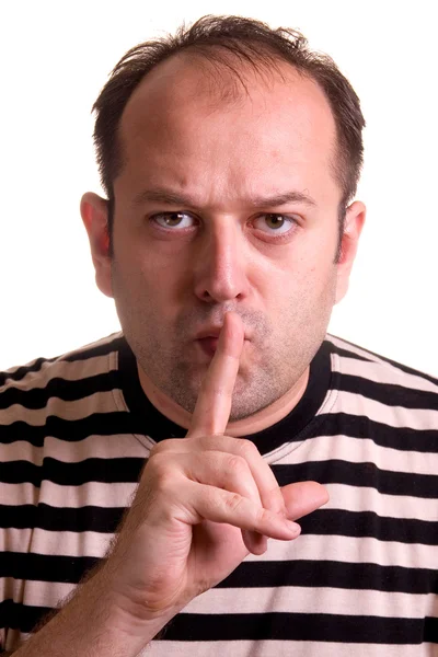 Hombre mostrando mantener silencio signo - shhh. El concepto —  Fotos de Stock