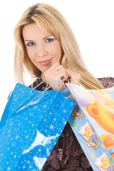 Menina loira com sacos de compras — Fotografia de Stock