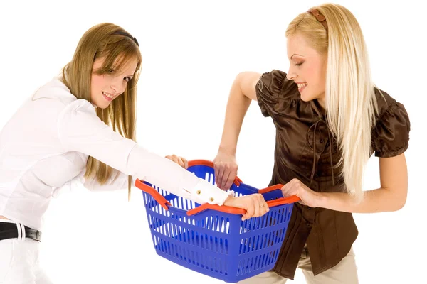 Two young girls with shopping basket — Stock Photo, Image
