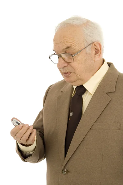Бизнесмен пользуется мобильным телефоном — стоковое фото