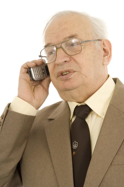 Зрелый бизнесмен, пользующийся сотовым телефоном — стоковое фото