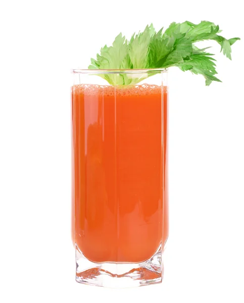 Морковный сок с листьями сельдерея — стоковое фото