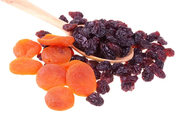 Dried fruits in a wood spoon — Stock Photo, Image