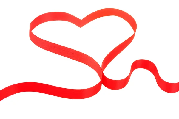Red ribbon in heart shape — Stock Photo, Image
