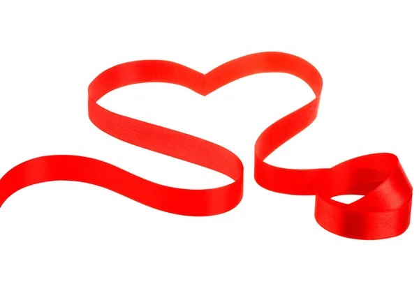Rött band i hjärta form — Stockfoto