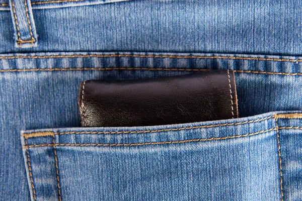 Plånbok i ryggen visar pocket jeans — Stockfoto