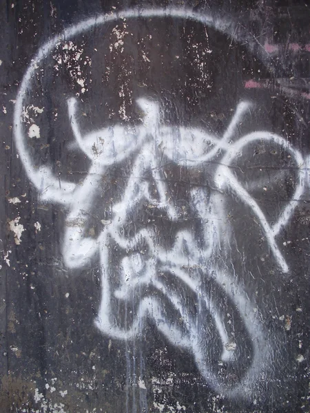 Graffiti. Crânio sobre um fundo preto . — Fotografia de Stock