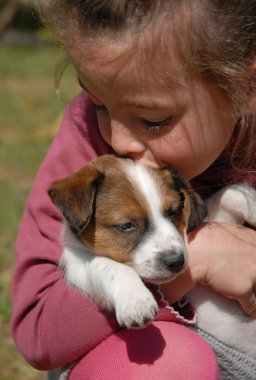 Child and puppy clipart