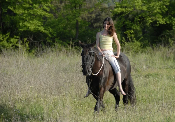 Mulher de equitação — Fotografia de Stock