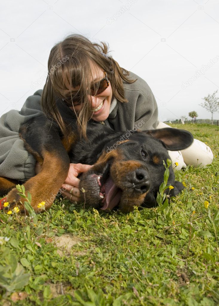 Smiling girl and dog