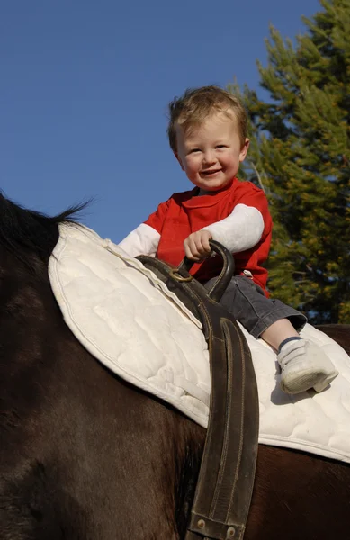 Riding little boy — Stock Photo, Image