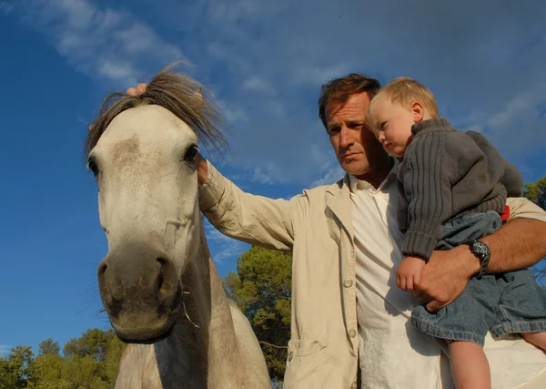 Man and little horse — Stock Photo, Image