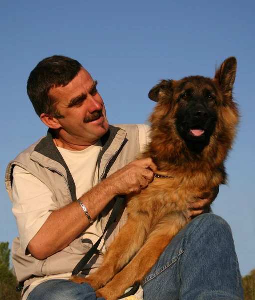 German shepherd and man — Stock Photo, Image